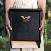 Eco-friendly two-chamber black cedar bat house for natural pest control and safe roosting