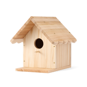 WildYard X Angry Birds™ DIY Birdhouse unpainted natural cedar kit — pre-assembled view showing slanted roof, circular entry hole and perch, ready to paint and decorate